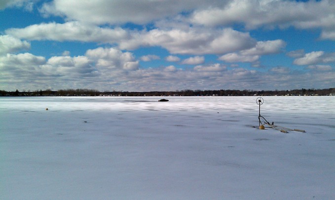 A woman was rescued by the Dexter Area Fire Department after driving her car onto Dexter Township's Portage Lake on Sunday, Feb. 17, 2013. Photo courtesy of Amy Conway O'Brien